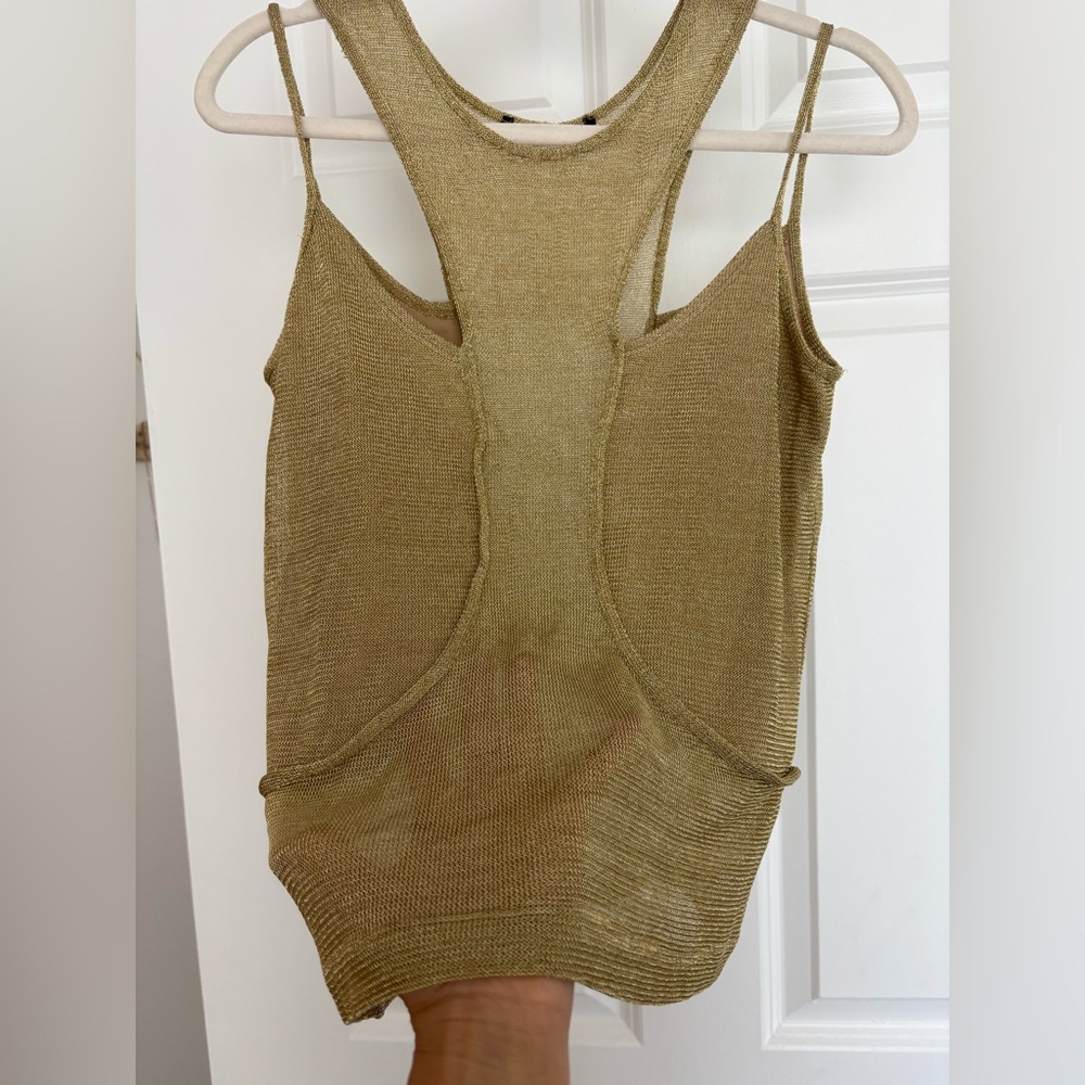 Gold shirt shimmers